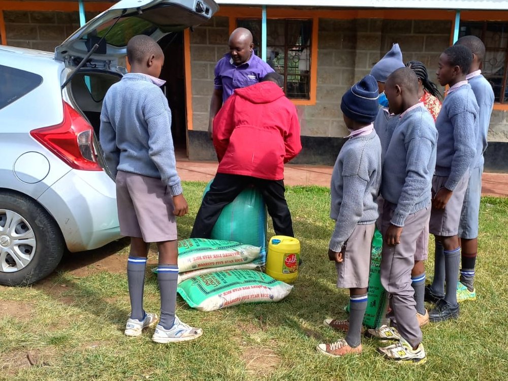 delivering food supplies to a primary school